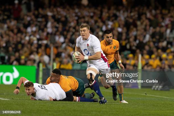 Tommy Freeman of England runs the ball during game three of the International Test match series between the Australia Wallabies and England at the...