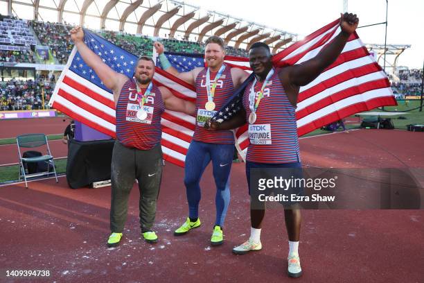 Silver medalist Joe Kovacs of Team United States, gold medalist Ryan Crouser of Team United States, and bronze medalist Josh Awotunde of Team United...