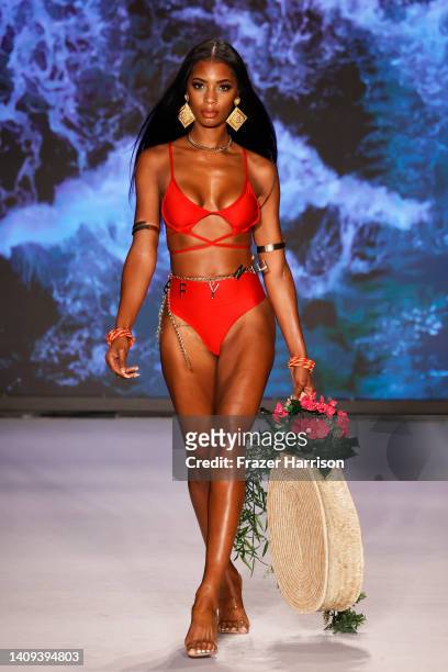 Model walks the runway for Models Of Colors Matters Presents BFyne at Paraiso for Miami Swim Week SS23 at The Paraiso Tent on July 17, 2022 in Miami...