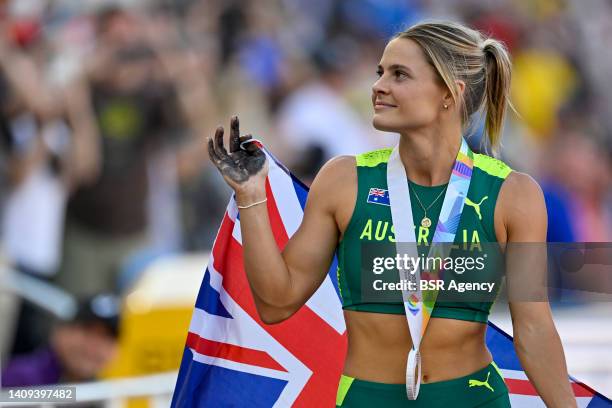 Nina Kennedy of Australia with flag showing the medal of Women's Pole Vault during the World Athletics Championships on July 17, 2022 in Eugene,...