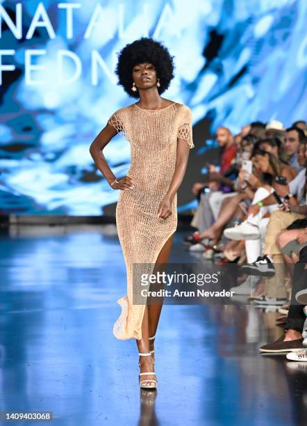 Model walks the runway wearing Natalia Fedner at Miami Swim Week powered by Art Hearts Fashion at Faena Forum on July 17, 2022 in Miami Beach,...