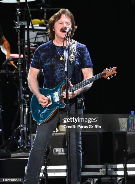 Tom Johnston performs onstage during the Doobie Brothers 50th Anniversary tour at Ameris Bank Amphitheatre on July 17, 2022 in Alpharetta, Georgia.