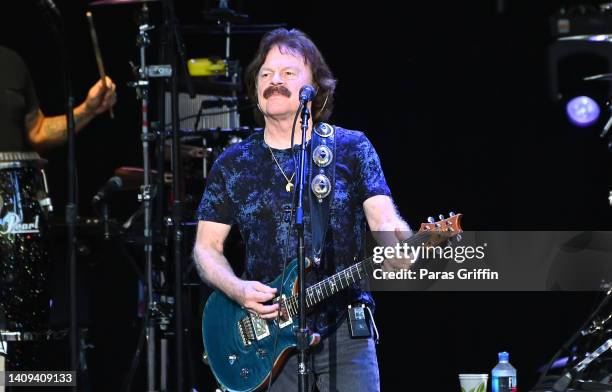 Tom Johnston performs onstage during the Doobie Brothers 50th Anniversary tour at Ameris Bank Amphitheatre on July 17, 2022 in Alpharetta, Georgia.