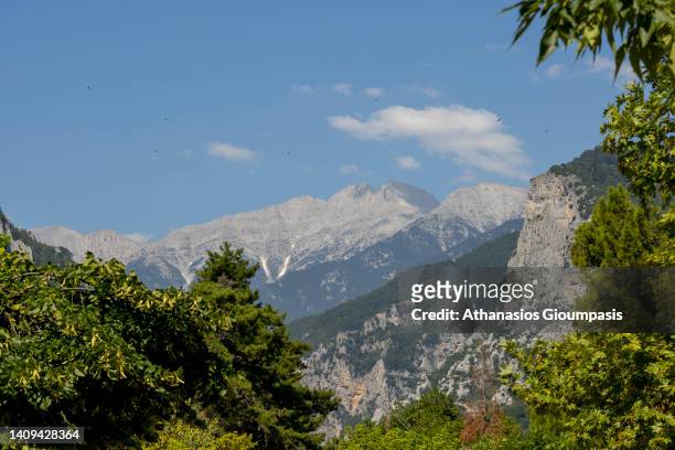 View of the Olympus mountain from Litochoro village on July 16, 2021 in Olympus National Park, Greece.