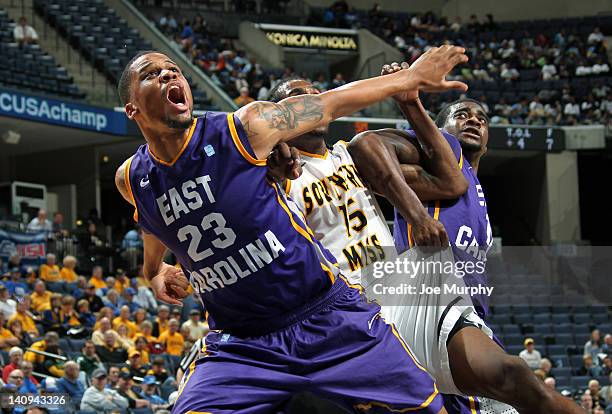 Erin Straughn of the East Carolina Pirates blocks out against Torye Pelham of the Southern Miss Golden Eagles during the Quarterfinals of the 2012...