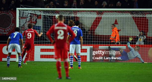 Luuk de Jong of Twente scores his teams first goal during the UEFA Europa League Round of 16 first leg match between FC Twente and FC Schalke 04 on...