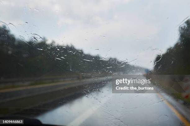 Windshield In Rain 621 Road Seen Through Wet Windshield Stock Photos, High-Res Pictures ...