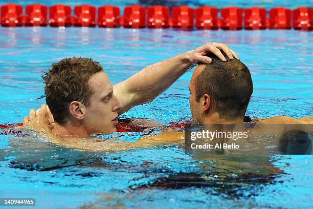 Jospeh Roebuck of Loughborough University S & WPC is congratulated by Roberto Pavoni of Loughborough University S & WPC after winning in the Men’s...