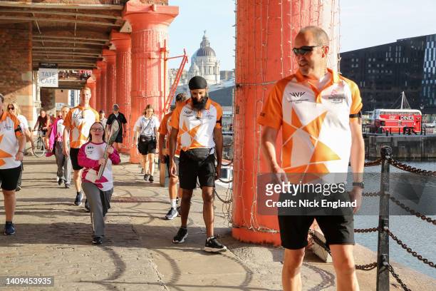 Batonbearer Shauna Hogan holds the Queen's Baton as it visits Liverpool as part of the Birmingham 2022 Queen's Baton Relay on July 18 Liverpool,...
