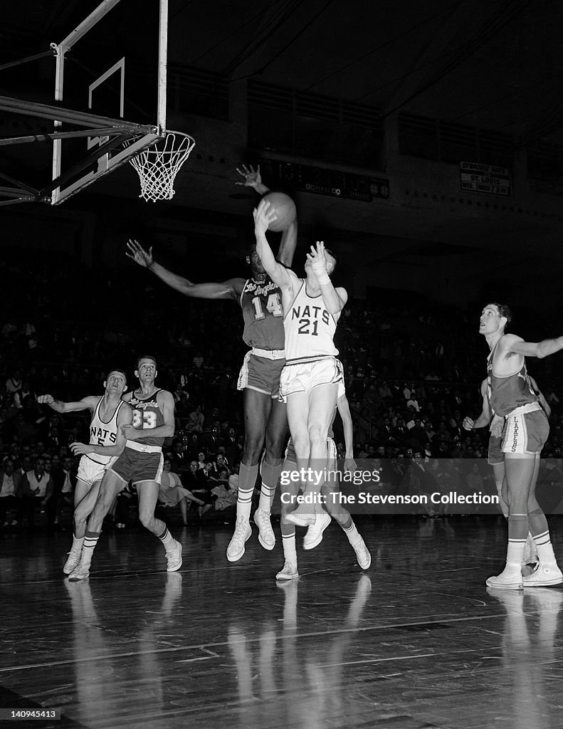 Larry Costello of the Syracuse Nationals shoots against Ray Felix of ...