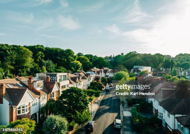 an elevated view of london houses at sunset - suburb foto e immagini stock