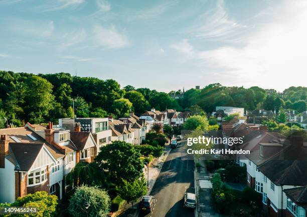 an elevated view of london houses at sunset - row house stock pictures, royalty-free photos & images