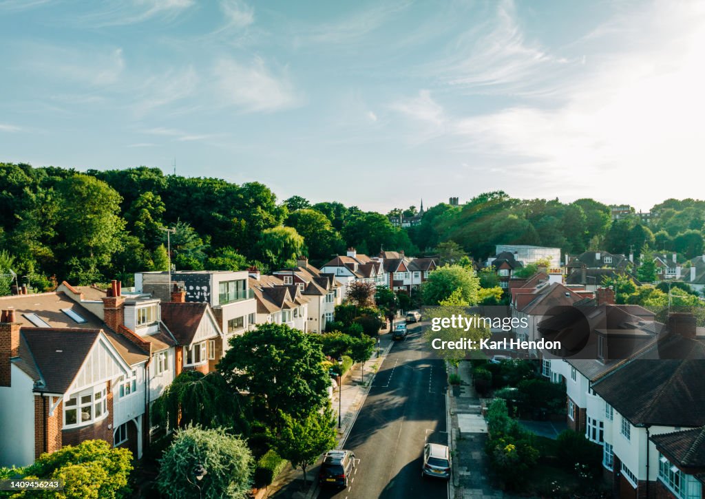 An elevated view of London houses at sunset