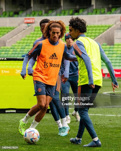 Zidane Iqbal and Hannibal Mejbri of Manchester United in action during a Manchester United pre-season training session at AAMI Park on July 18, 2022...