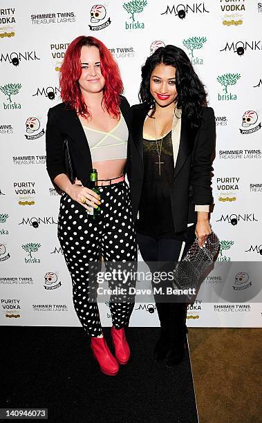 Etta Bond and Vanessa White attend the launch of Swedish fashion brand Monki's new Carnaby Street flagship store on March 8, 2012 in London, England.