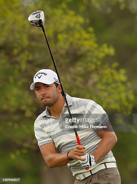 Pablo Larrazabal of Spain watches his tee shot on the fifth hole during first round of the World Golf Championships-Cadillac Championship on the TPC...
