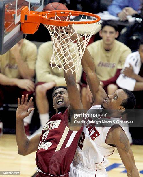 State guard Lorenzo Brown blocks a second half shot by Boston College forward Ryan Kilcullen during N.C. State's 78-57 victory over Boston College in...