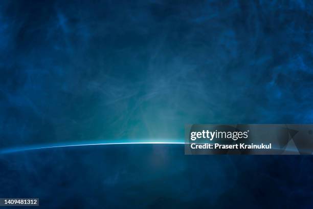 blue rays with blue smoke background - logo star stock pictures, royalty-free photos & images