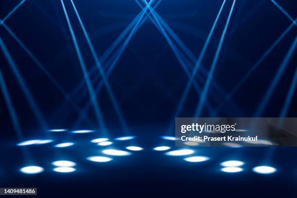 blue stage under concert lighting - concert lights stock pictures, royalty-free photos & images