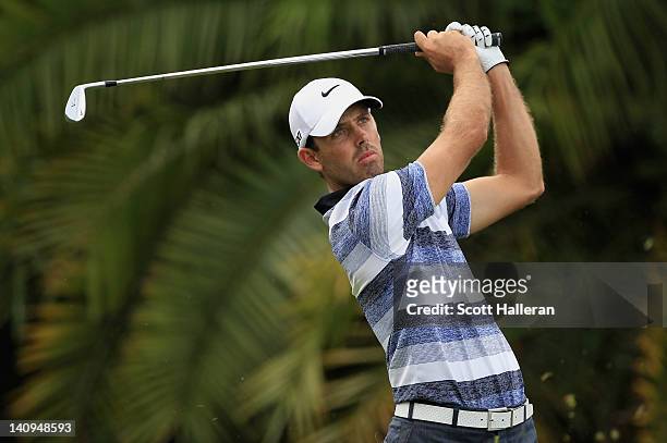 Charl Schwartzel of South Africa watches his tee shot on the 15th hole during first round of the World Golf Championships-Cadillac Championship on...