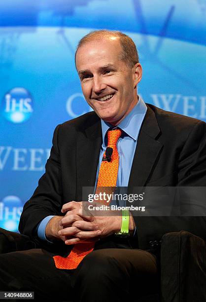 David Crane, president and chief executive officer of NRG Energy Inc., smiles during a panel discussion at the 2012 CERAWEEK conference in Houston,...