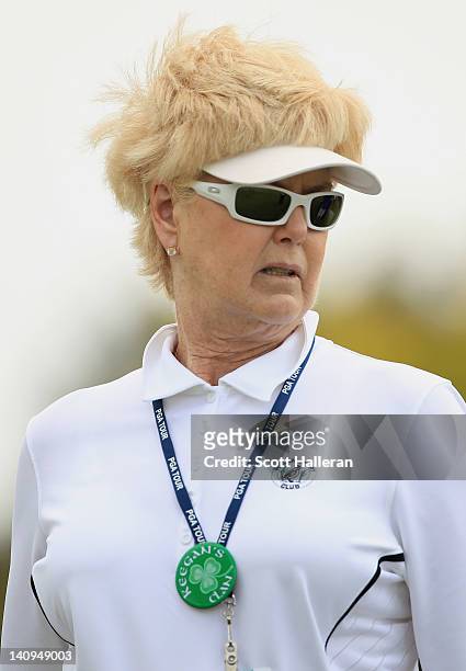 Pat Bradley watches the play of her nephew Keegan during first round of the World Golf Championships-Cadillac Championship on the TPC Blue Monster at...
