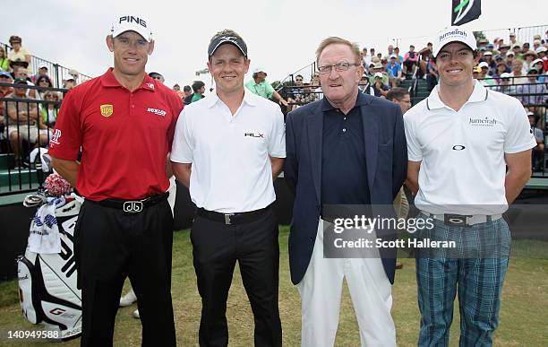 Lee Westwood, Luke Donald, Richard Hills of the European Tour and Rory McIlroy pose on the tenth tee during first round of the World Golf...