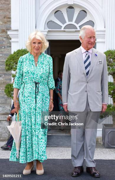 Camilla, Duchess of Cornwall and Prince Charles, Prince of Wales arrive for a garden party at Boconnoc House to mark the 70th anniversary of The Duke...