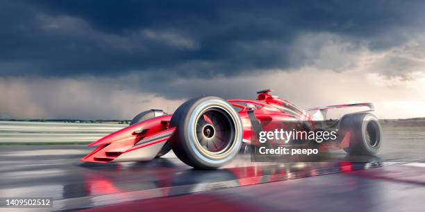 racing car moving at high speed on racetrack - close to finish line stock pictures, royalty-free photos & images