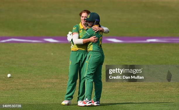Nadine de Klerk of South Africa celebrates with Trisha Chetty of South Africa after taking the wicket of Sophia Dunkley of England during the 3rd...
