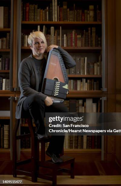 Penelope Houston with her autoharp in the rare books room at the San Francisco Public Library Main Branch in San Francisco, Calif., on Monday,...