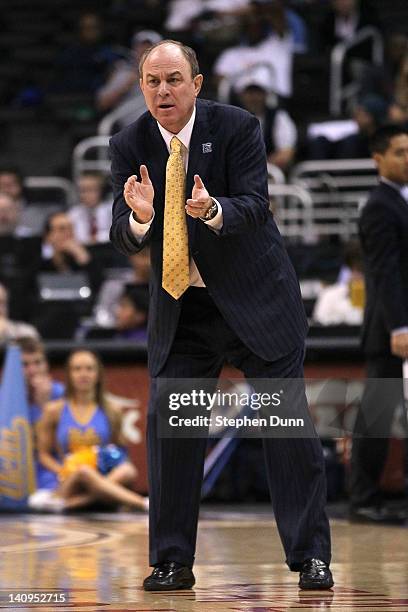 Head coach Ben Howland of the UCLA Bruins reacts in the second half as the Bruins take on the Arizona Wildcats during the quarterfinals of the 2012...