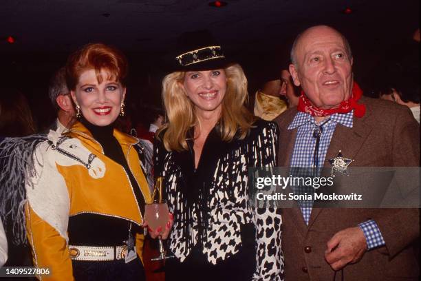 Portrait of American business executive Georgette Mosbacher, Czech-American businesswoman Ivana Trump , and socialite Jerry Zipkin attend a 'Texas...