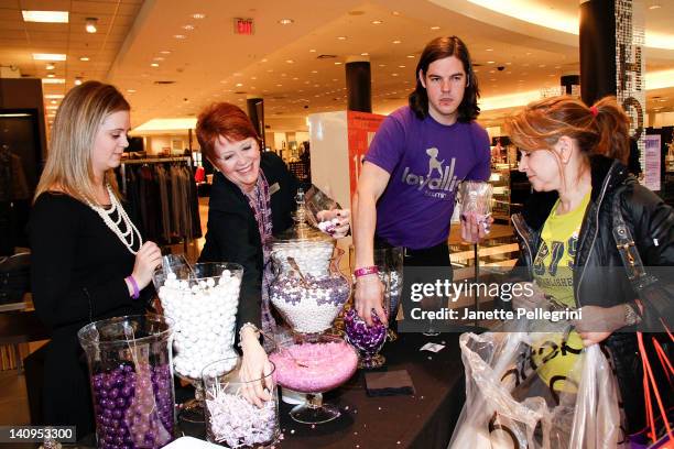 Central PR Assistant Jackie Lambert and Manager of Customer Loyalty Mimi Calvo with customers at the Bloomingdale's Loyallist Launch Party at...