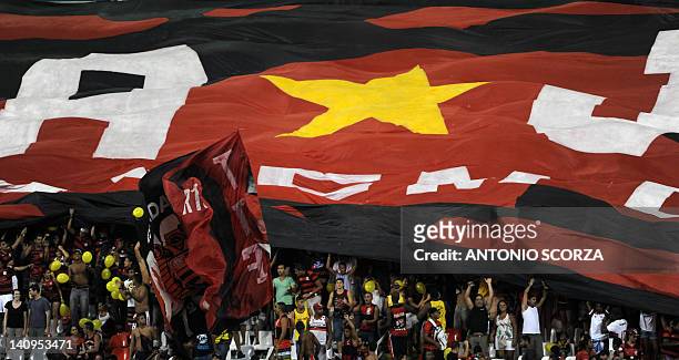 Brazilian Flamengo' supporters celebrates their victory by 1-0 over Ecuadorean Emelec in their Libertadores Cup football match on March 8, 2012 at...