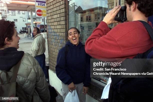 Alize Asberry, center, mugs in front of cameraman Tim Bremnen, while Arianna Garden Vazquez, director of Youth Leadership Institute in San Francisco,...