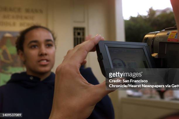 Alize Asberry, standing in front of Horace Mann Elementary in San Francisco, Ca., on Friday, September 24 practices her closing statement for a video...