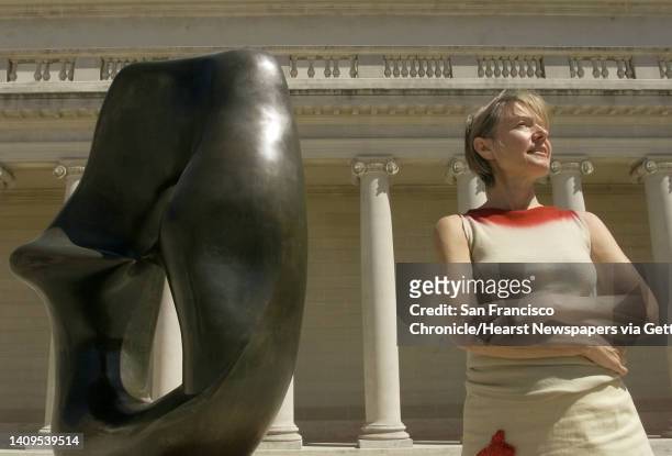 Mary Moore, daughter of mid-20th century sculpture, Henry Moore, with his piece, ""Two Points,"" at the Palace of the Legion of Honor in San...