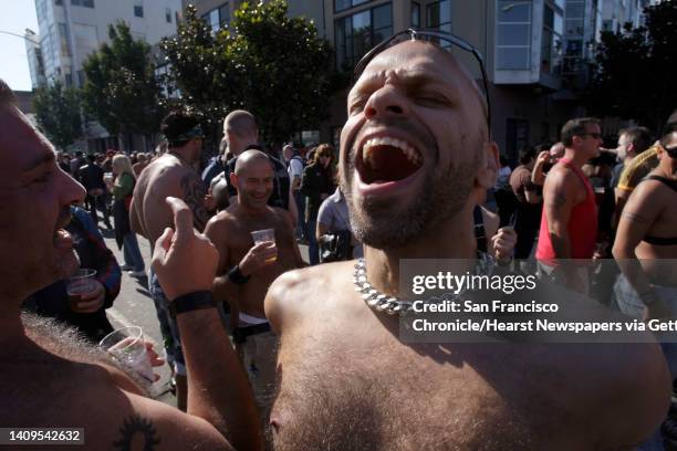 Festival goer from Amsterdam, reacts to being spanked by a passerby at the Folsom Street Fair. Thousands attended the 25th anniversary Folsom Street...