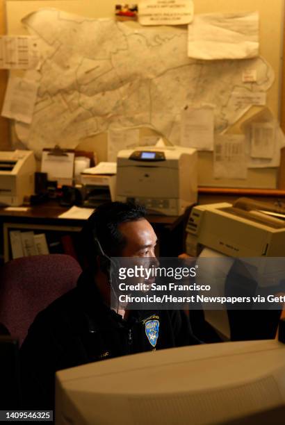 Greg Damo, a communication dispatcher, takes a call in the Oakland police dispatch center on Tuesday, April 27, 2010. After learning that Oakland...