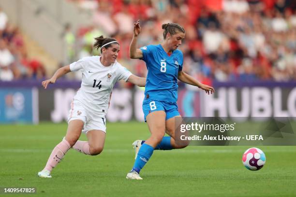 Karolina Lea Vilhjalmsdottir of Iceland is challenged by Charlotte Bilbault of France during the UEFA Women's Euro 2022 group D match between Iceland...