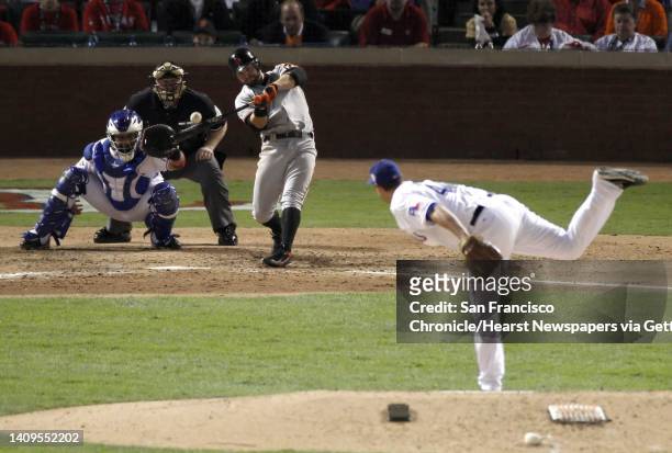 San Francisco Giants center fielder Cody Ross hits a solo homer in the 7th inning making the score 4-1 during game 3 of the 2010 World Series between...