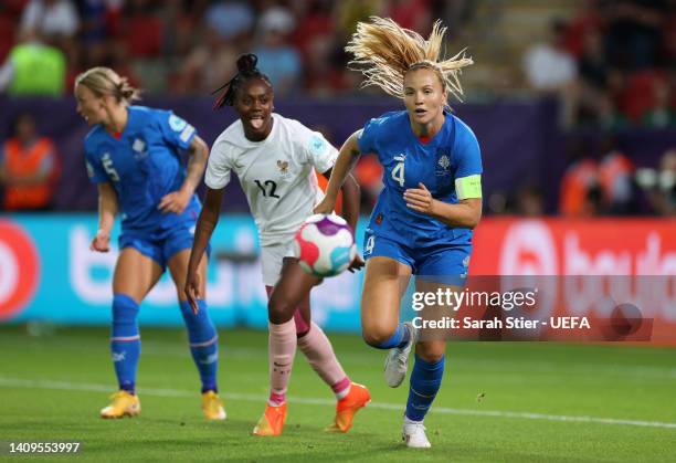 Glodis Viggosdottir of Iceland chases the ball during the UEFA Women's Euro 2022 group D match between Iceland and France at The New York Stadium on...