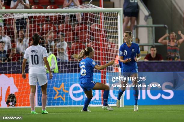 Dagny Brynjarsdottir of Iceland celebrates after scoring their side's first goal from the penalty spot during the UEFA Women's Euro 2022 group D...