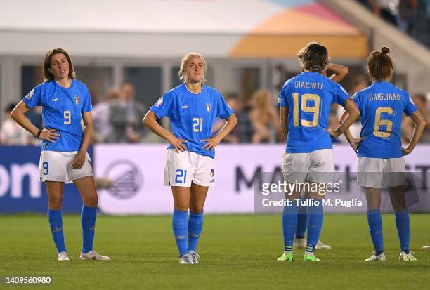 Daniela Sabatino and Valentina Cernoia of Italy look dejected following their side's defeat in the UEFA Women's Euro 2022 group D match between Italy...