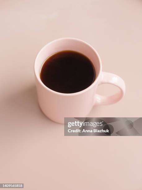 pink coffee cup on pink table - broken mug stock pictures, royalty-free photos & images