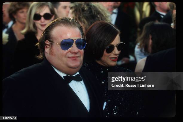 Actor Chris Farley arrives at the 69th Annual Academy Awards ceremony March 24, 1997 in Los Angeles, CA.