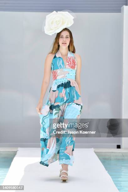 Model walks the runway wearing ContraCorriente during Flying Solo Miami Swim Week 2022 on July 18, 2022 in Miami Beach, Florida.