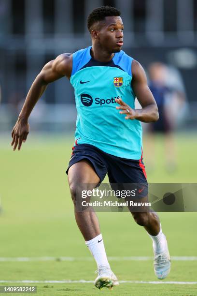 Ansu Fati of FC Barcelona participates in a training session ahead of the preseason friendly against Inter Miami CF at DRV PNK Stadium on July 18,...