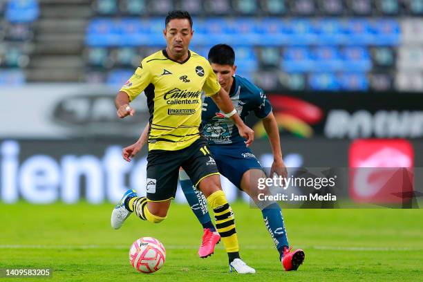 Marco Fabian of Mazatlan fights for the ball with Miguel Tapias of Pachuca during the 3rd round match between Pachuca and Mazatlan FC as part of the...